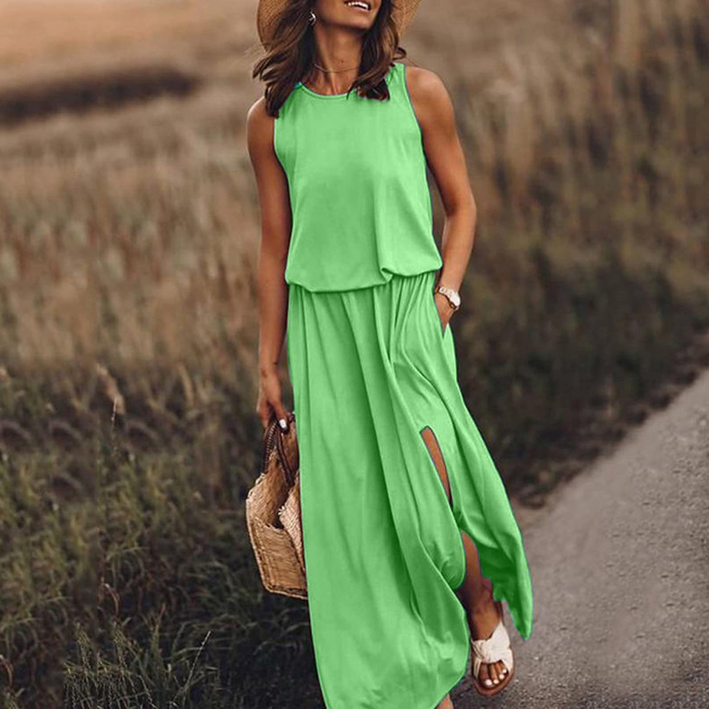 Round necked sleeveless dress with split solid color long skirt