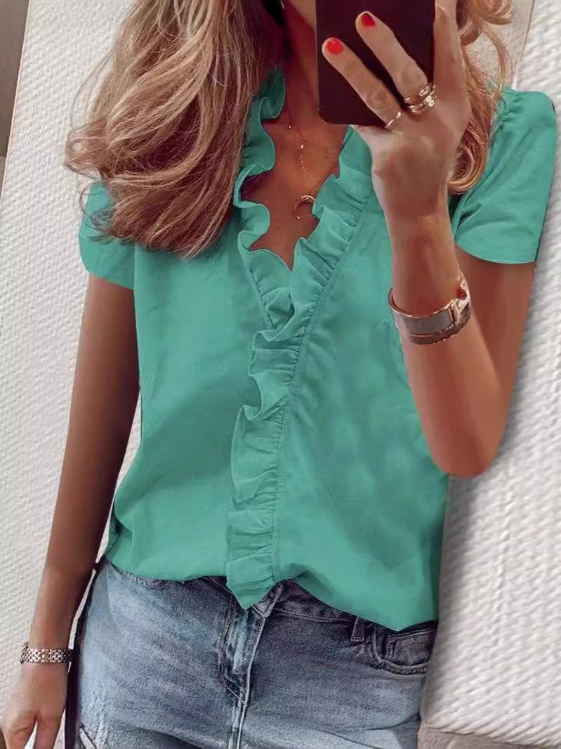 New European and American short sleeved ruffled shirt for woman.