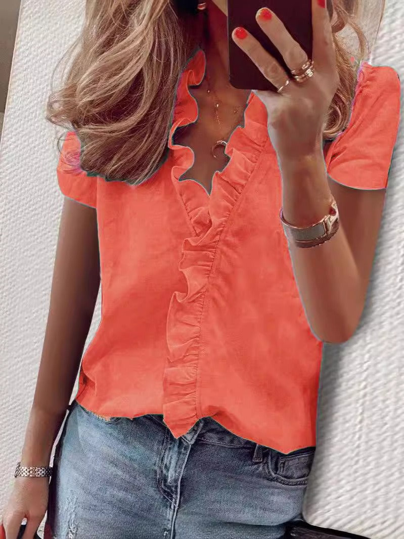 New European and American short sleeved ruffled shirt for woman.