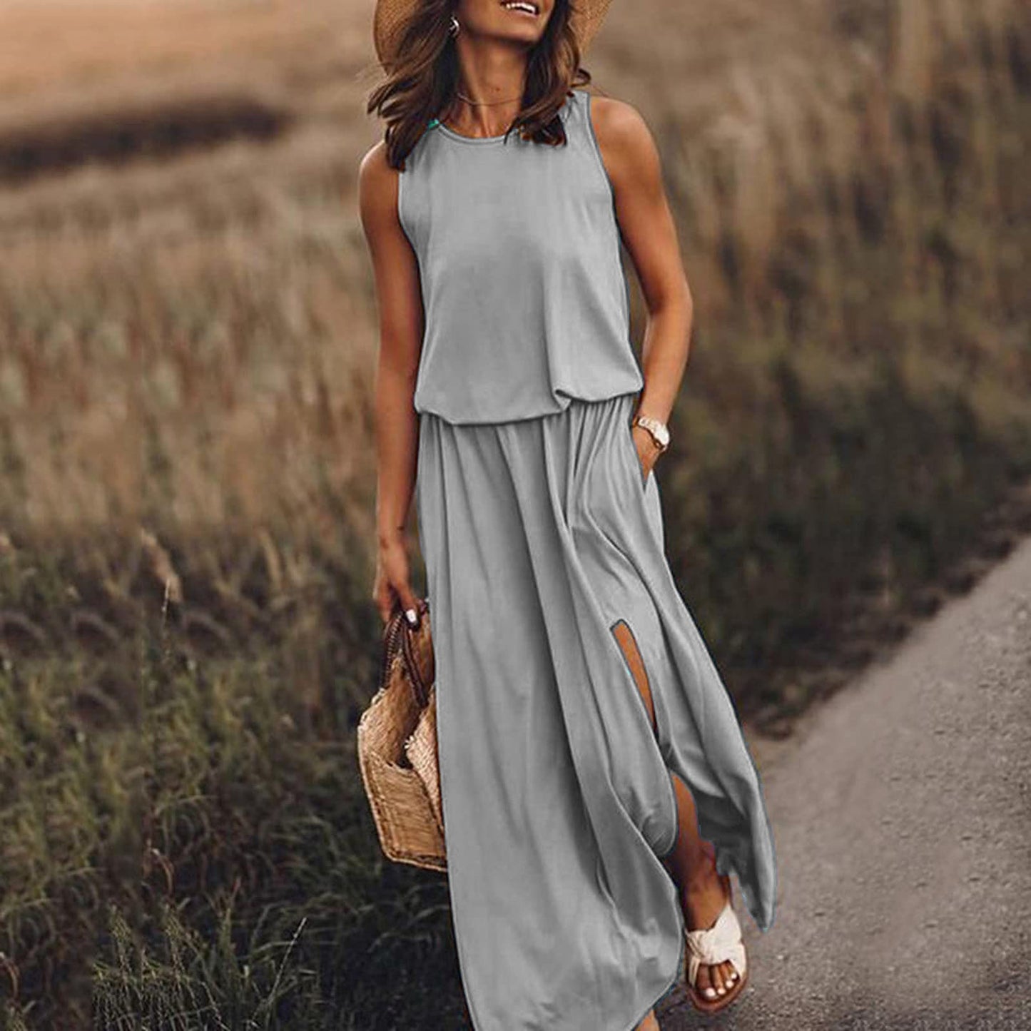 Round necked sleeveless dress with split solid color long skirt